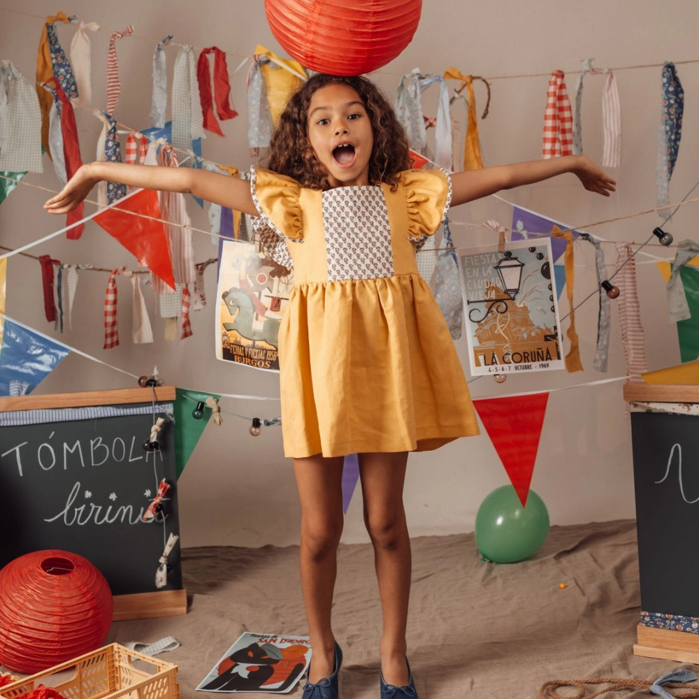 Birinit Petit Plazuela bow dress Joy Glow