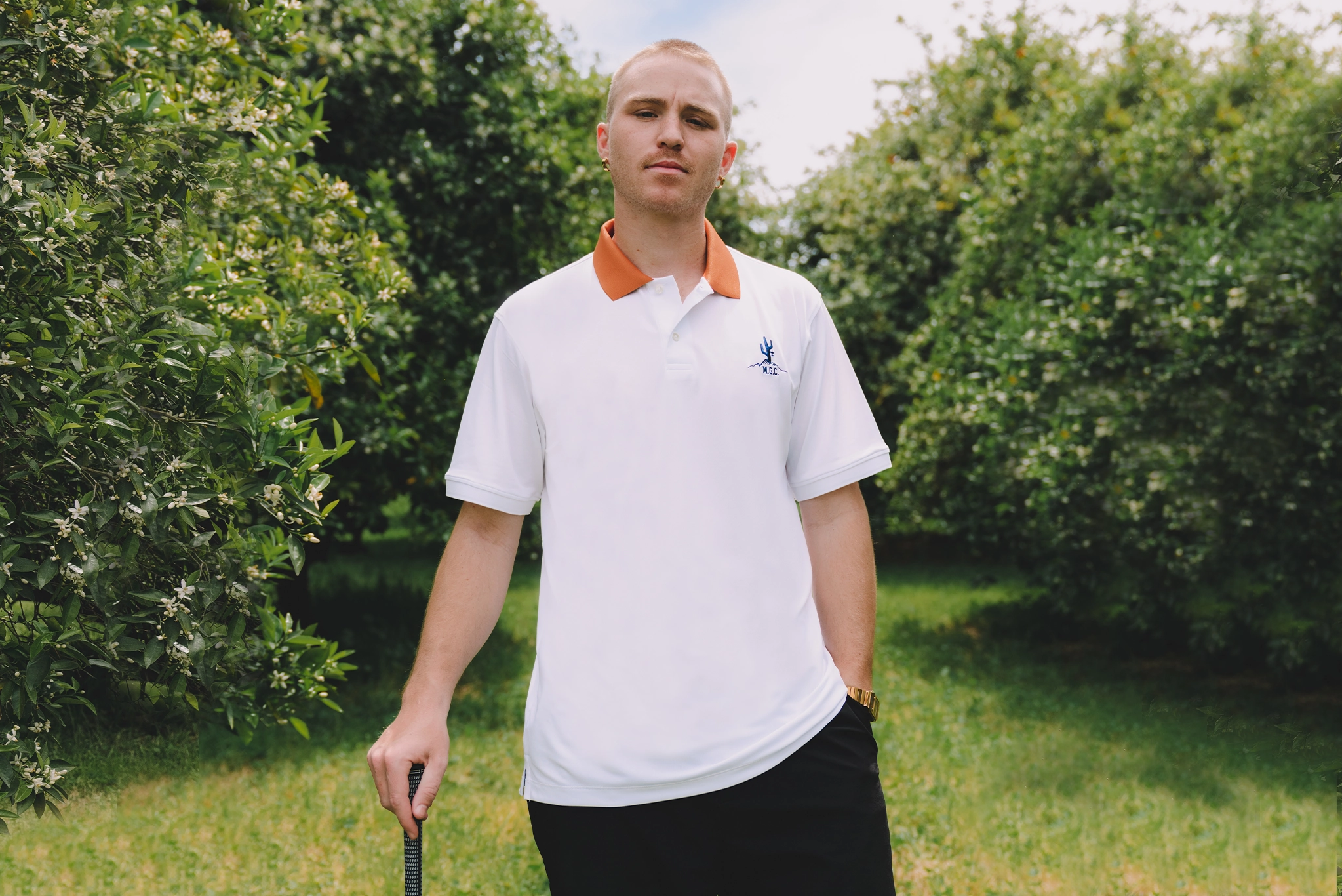 Anti Static Treatment Manor Golf Club "Southwestern Hang Time"  M - White / Navy / Sunburst Orange