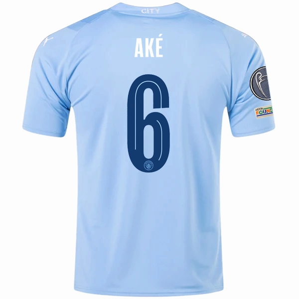 Air Optimized Eco Conscious Manufacturing Puma Manchester City Nathan Ake Home Jersey w/ Champions League   Club World Cup Patches 23/24 (Team Light Blue/Puma White)